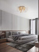 Gatlin LED Deckenleuchte 7-flammig Ø 68cm 3000K Messing-Gold in modernem Schlafzimmer