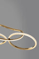 Girish LED Pendelleuchte 4-flammig 3000K Gold mit organisch geformten Ringen in edlem Gold.