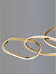 Girish LED Pendelleuchte 4-flammig 3000K Gold mit organisch geformten Ringen in edlem Gold.