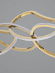 Girish LED Pendelleuchte 4-flammig 3000K Gold mit organisch geformten Ringen in edlem Gold.