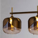 Glamuröse Hängeleuchte Goblet Quattro Gold mit eleganten Lampenschirmen und Messing-Finish.