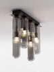 Gustave LED Deckenleuchte Rauchgrau mit fünf zylindrischen Rauchglasleuchten und elegantem Design.