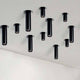 GU10 Einbau-Spot Gypsum Downlight Tube 33cm Schwarz mit mehreren schlanken Zylindern an der Decke.