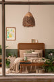 Hay Pendelleuchte E27 Ø 61cm Braun über einem gemütlichen Bett im BOHO-Stil.