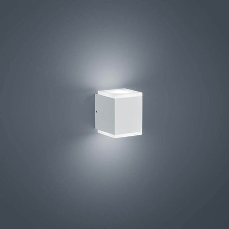 LED Kibo IP54 white outdoor wall light on a grey wall, stylish design and warm light.