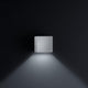 LED Außen-Wandleuchte Siri 44 - L IP54 Silbergrau an einer dunklen Wand mit sanftem Licht.