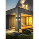LED Außen-Wandlampe Swift IP65 Graphit leuchtet an einem modernen Haus, stilvolle Außenbeleuchtung.