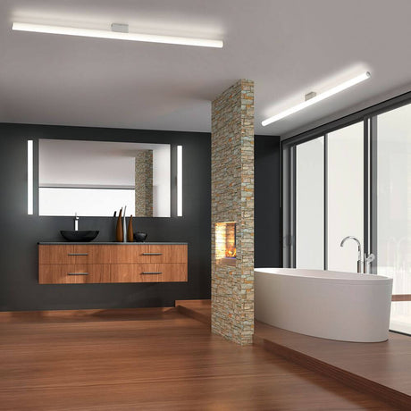 LED Bad Spiegelleuchte Loom 60cm 1130lm chrom Warmweiß in modernem Badezimmer mit Holz- und Steinelementen.