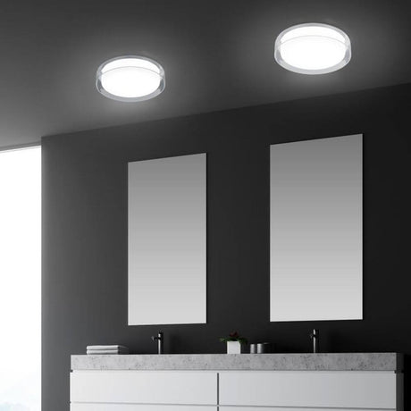 LED Badlampe Olvi 1020lm IP44 in modernem Badezimmer-Design mit eleganten Spiegeln.