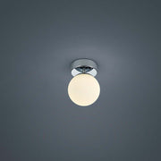 LED Keto chrome ceiling light with a stylish, round design and a glossy chrome top.