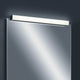 LED Spiegellampe Lado 90cm 1560lm Schwarz Warmweiß über einem modernen Spiegel befestigt.