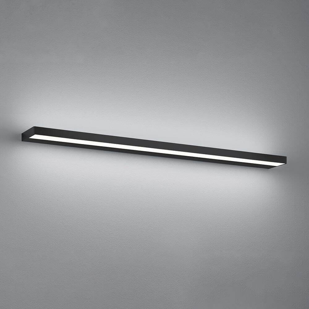 LED Wandlampe Slate IP44 Schwarz an einer Wand montiert, bietet elegantes Up- und Downlight für jeden Raum.