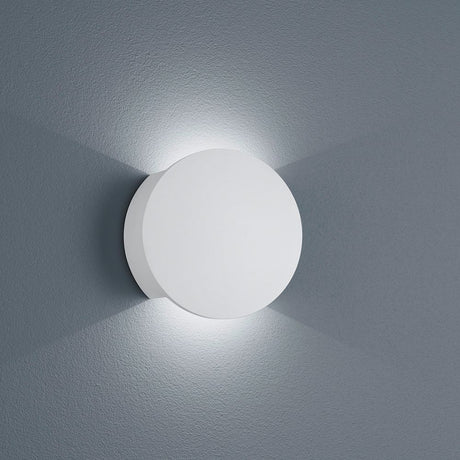LED Wandleuchte Pont Gips Weiß an einer grauen Wand, ideales Licht für Flure und Wohnräume.