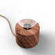 Holz Tischlampe Ø 11cm in Naturholz mit minimalistischem Design und gläserner Glühbirne.