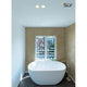 IP HORN 1xGU10 Weiß in modernem Badezimmer mit freistehender Badewanne und Fenster