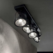 Ceiling light Glim 4-light Black with four black lamps in the ceiling image.