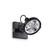 Deckenlampe Glim Schwarz an der Wand montiert, moderne und stilvolle Beleuchtungslösung.