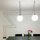 Hängeleuchte Boa Sp1 für Wandauslass Schwarz mit zwei Lichtquellen und stylischem Kabeldesign.