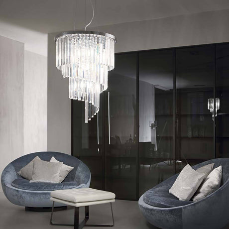 Hängeleuchte Carlton Sp12 im modernen Wohnraum mit eleganten Sesseln und stilvoller Beleuchtung.