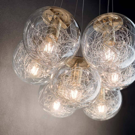 Pendant light Mapa Sat Sp7 Ottone with transparent spheres and delicate wire design.
