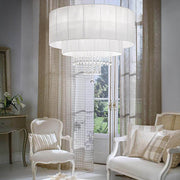 Pendant light Opera Sp10 White in an elegant living room with modern furniture and stylish curtains.