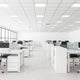 LED Einbau-Panel 60x60cm in modernem Büro mit Schreibtischen und Computern.
