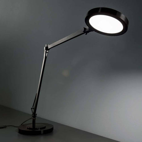 LED Tischleuchte Futura Touchdimmer Schwarz auf einem Tisch, elegant und modern mit verstellbarem Arm.