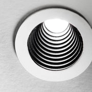 One LED Einbauspot - Nahaufnahme des Einbauleuchtens mit spiralförmigem Design.