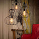 Pendelleuchte Ampolla-1 Weiß in modernem Design, kombiniert mit anderen originellen Lampen. Ideal für stilvolle Innenräume.