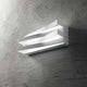 Virtus LED Wandleuchte Metall Acryl an einer Betonwand montiert, modernes Design und warmes Licht.