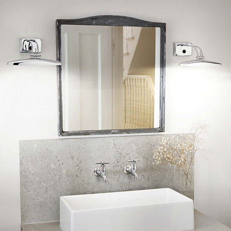 Wall light Mirror-20 Ap2 Chrome above a modern washbasin with mirror and stylish design.