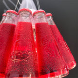 Ingo Maurer Hängelampe Campari Light mit roten Campari-Flaschen als Lampenschirm