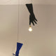 Ingo Maurer LED Hängeleuchte Black Luzy Handschuh mit schwarzem Gummihandschuh und Glühbirne.