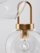 Irvine Pendelleuchte 3-flammig Ø 30cm Gold, Transparent Detailansicht der Fassung mit Glühbirne.
