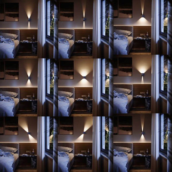 Moderna s.luce Ixa LED Lampada da parete High Power IP20 in un elegante allestimento da camera da letto.