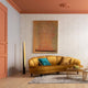 LED Stehleuchte Tube Duo 140cm neben einer eleganten Couch in modernem Wohnraum