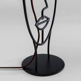 Tischleuchte Face Wire Nature in stilvollem Design mit freundlichem Gesicht aus Metall.
