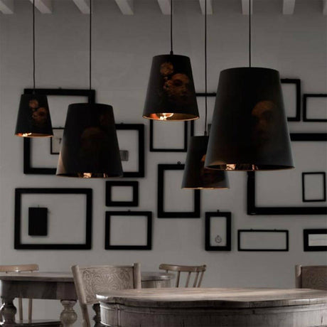 Karman Cupido textile pendant light in a modern living space with various lampshades