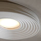 Karman LED-Deckenleuchte R.O.M.A. mit gewelltem Design und zentraler Lichtquelle.