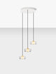Keros LED Pendelleuchte 3-flammig 3000K Gold mit drei Lampenschirmen und goldenen Elementen.