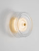 Keros LED Wandleuchte 3000K Gold an der Wand, elegantes Design mit goldenen Akzenten.