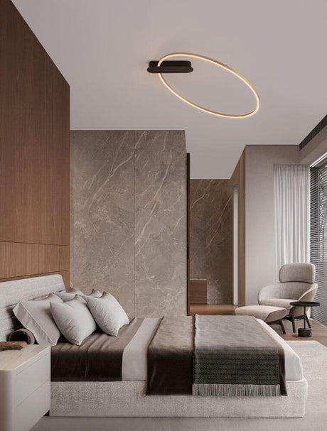 Kiklos LED Deckenleuchte Ø 64cm in modernem Schlafzimmer mit sanftem Licht bei 3000K.