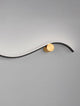 Kima LED Wandleuchte Geschwungen 3000K Schwarz, Gold mit elegantem Design und harmonischen Farben.