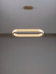 Kinara Pendelleuchte Stadion 3000K Gold mit elegantem Design und warmweißem Licht für stilvolle Räume.