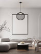 Kinetic LED Pendelleuchte 3000K Schwarz im modernen Wohnraum mit weißem Hintergrund und eleganter Einrichtung.