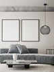 Kinetic LED Pendelleuchte 3000K Schwarz im modernen Wohnzimmer mit Couch und minimalistischer Dekoration.