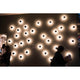 Kundalini LED-Wandleuchte Azou 3-flammig Dimmbar, innovative Lichtinstallation an einer Wand.
