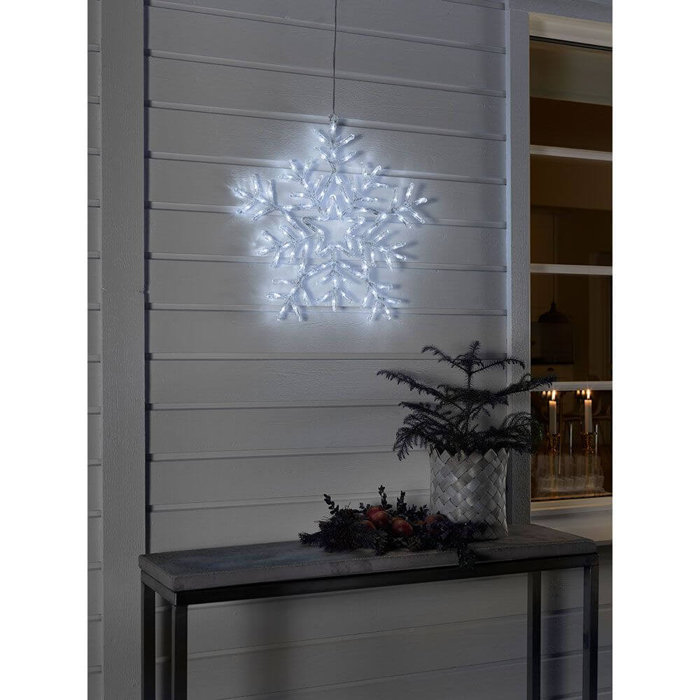 LED Acryl Schneeflocke mit 8 Funktionen 90 Kaltweiße Dioden IP44 leuchtet an der Wand als festliche Dekoration.