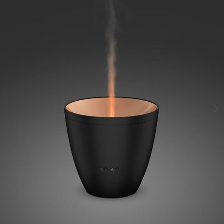 LED Aroma Diffuser Zoe candeeiro de mesa com luz de efeito em preto com luz âmbar e nevoeiro.
