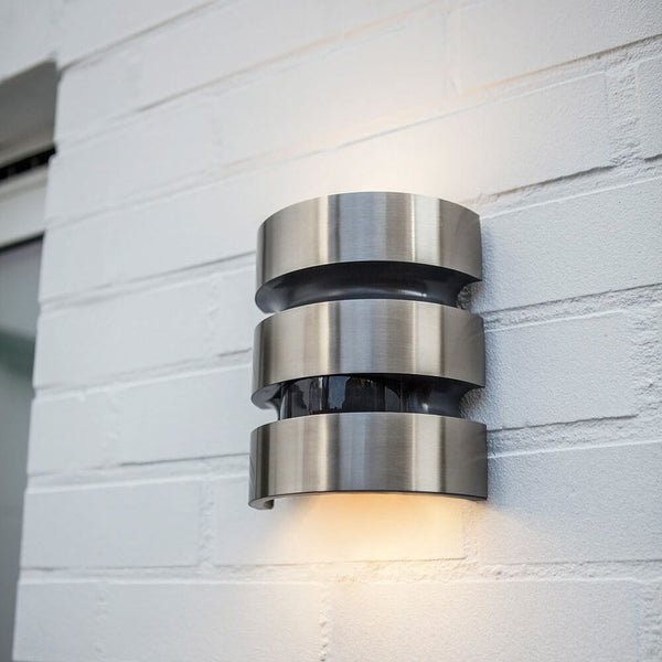 LED Maya outdoor light IP44 stainless steel mounted on a white wall.